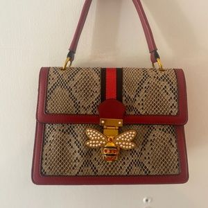 Black leather handle purse, shoulder strap, skin , pearl butterfly,